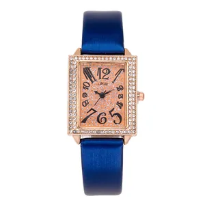 Elegant women's rectangular quartz watch with rose gold rhinestone bezel and blue strap