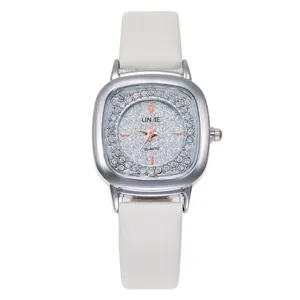 Women's quartz watch with square silver case, sparkling dial and white leather strap