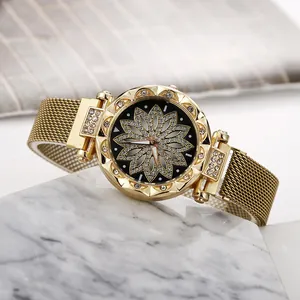 Elegant gold lotus-shaped women's watch with rhinestone dial and Milanese mesh band