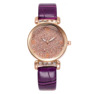 Elegant rose gold watch with purple leather strap and rhinestone studded dial for women
