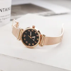 Orologio elegante da donna con quadrante nero stellato e cinturino a rete oro rosa