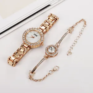 Elegant rose gold women's watch and crystal bracelet set with sparkling rhinestone bezel