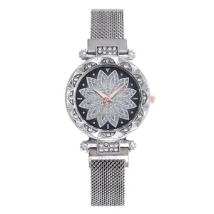 Detail of the Milanese mesh steel strap with secure magnetic clasp on this women's watch