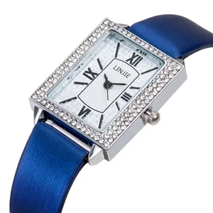 Rectangle silver watch for women with rhinestone inlay and royal blue satin strap
