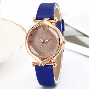 Montre quartz femme élégante avec bracelet cuir bleu et lunette en strass doré rose