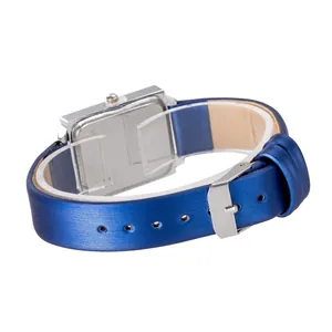 Detailed back view of rectangular silver watch case with shiny blue leather strap