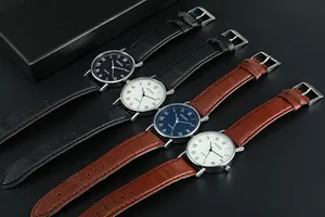 Detail view of four Geneva quartz watches with Roman numerals and leather straps