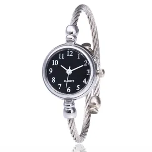 Elegant silver cable bracelet watch with a minimalist black dial for women