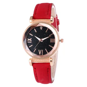 Women's rose gold quartz watch with a starry black dial and red leather strap
