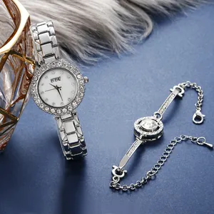 Elegant women silver rhinestone watch and bracelet gift set on luxury velvet background
