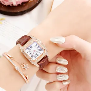 Women's rose gold square quartz watch with brown leather strap and star charm bracelet