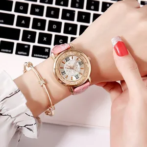 Women's rose gold watch and bracelet set with pink leather strap and rhinestone bezel