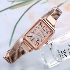 Women's rose gold rectangular quartz watch with crystal inlay and milanese mesh strap