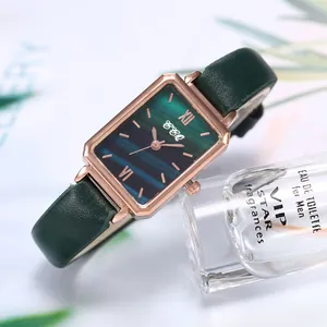 Elegant ladies vintage quartz watch with green leather strap and rose gold rectangular case