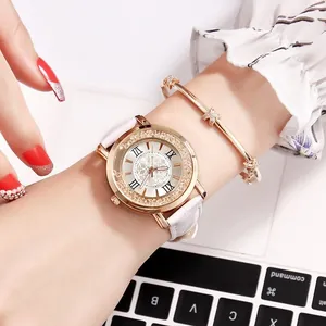 Elegant women's quartz watch with rhinestone bezel and matching star bracelet set