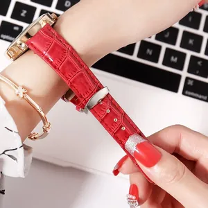 Fashionable red crocodile pattern leather watch strap with a golden case and silver buckle