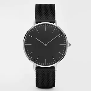 Detail of minimalist black dial watch with silver case and Milanese mesh steel strap