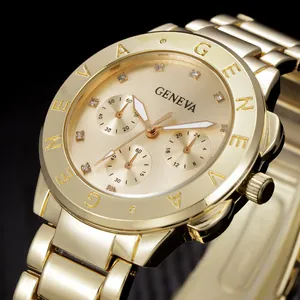Macro view of golden Geneva quartz watch with diamond-set markers and metallic finish