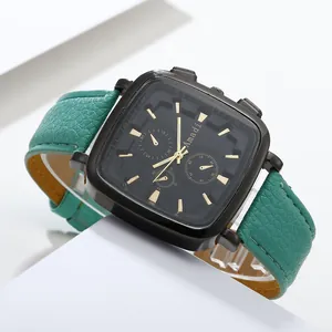 Modern square watch with black dial, gold markers, and green pebble leather strap