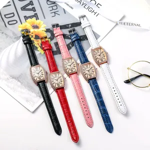 Montre quartz tonneau pour femme avec lunette en cristaux et bracelets en cuir