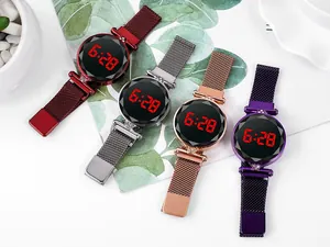 Detail of four colorful LED digital watches with Milanese mesh straps and crystal cut glass