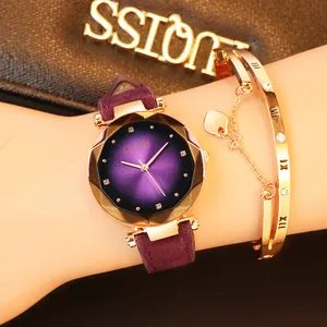 Close-up of purple gradient watch with faceted glass and matching rose gold heart bracelet
