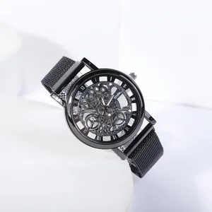 Binola men's matte black hollow dial watch with Roman numerals and Milanese mesh strap