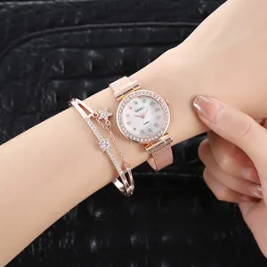 Orologio al quarzo oro rosa con quadrante in strass, cinturino a rete e bracciale a stella