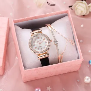 Coffret montre femme avec lunette en strass, cadran en nacre et bracelet étoile assorti