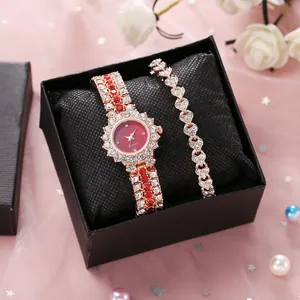 Conjunto de reloj y pulsera corazón en oro rosa con brillantes rojos y blancos