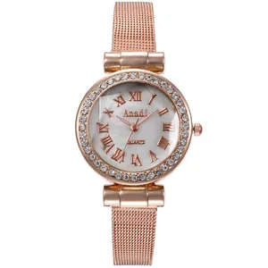 Orologio da donna oro rosa con cinturino a maglia e lunetta con strass scintillanti