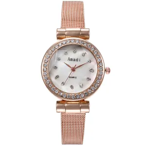 Orologio da donna in oro rosa con lunetta in strass e cinturino a maglia milanese