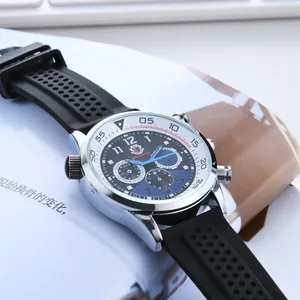 Men's Sonata sports chronograph watch with black silicone strap on a modern desk