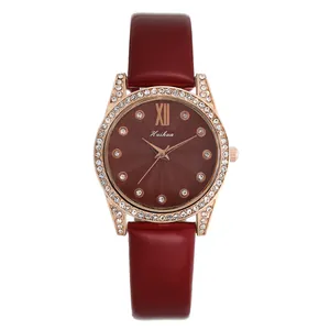 Orologio elegante da donna con cinturino in pelle rossa, lunetta con strass e cassa oro rosa