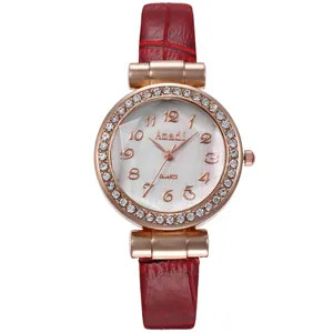 Montre à quartz pour femme avec bracelet en cuir rouge et lunette en cristal