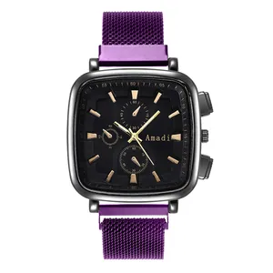 Detailed close-up of square black dial with rose gold markers and purple mesh metal strap