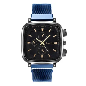 Detailed view of square blue mesh watch with black dial and gold indices