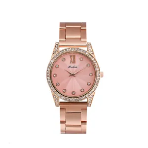 Montre quartz femme en or rose élégante avec lunette diamantée et cadran rose soleil