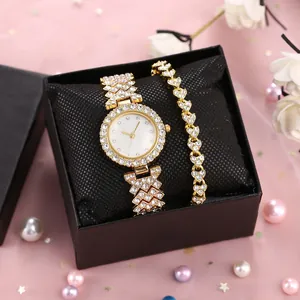 Set regalo orologio al quarzo dorato con lunetta in strass e bracciale a cuore abbinato