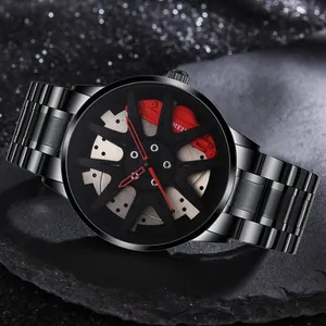Macro shot of car wheel rim watch face with red brake caliper and black metal strap