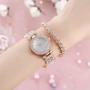 Set orologio e bracciale in oro rosa da donna con cristalli e quadrante in madreperla
