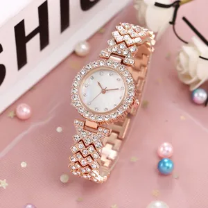 Set orologio da donna in oro rosa con brillanti e quadrante in madreperla bianca
