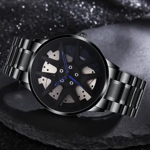 Close-up of a racing car wheel rim dial design with blue hands on a black steel watch