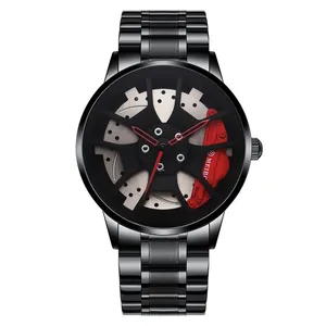 Detail of creative car wheel hub watch face with red brake caliper and black steel strap