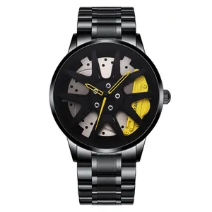 Detail of a racing-style watch featuring a black car wheel rim dial and a yellow brake caliper