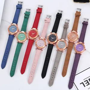 Elegant women's quartz watches with frosted leather straps in nine colors on marble background