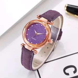 Detail of purple starry sky dial watch with rose gold case and sparkling rhinestones