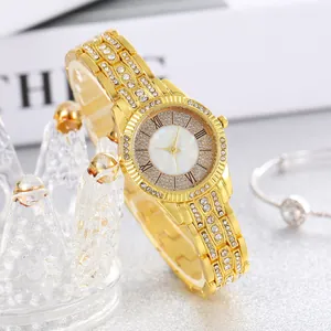 Luxurious gold women's quartz watch with sparkling rhinestones and mother-of-pearl dial