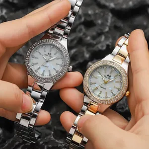 Lussuoso Orologio al Quarzo da Donna Lunetta con Strass Quadrante in Madreperla Cinturino in Lega Minimalista Orologio da Polso
