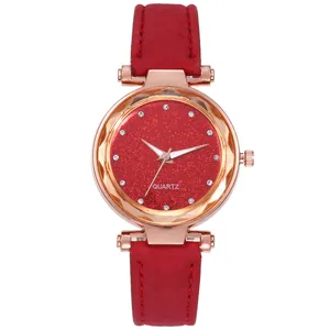 Women's quartz watch with red starburst dial, rhinestone markers and rose gold case